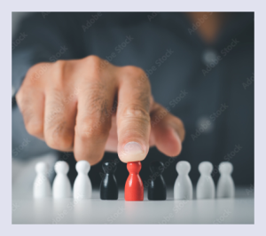 Close up of hand playing chess.